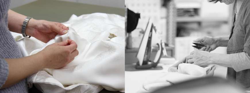 ドレスのサイズ調整をする女性の手作業風景